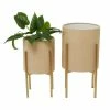 Litton Lane CosmoLiving by Cosmopolitan 23 in. H x 12 in. Beige Metal Bohemian Planter ( Set of 2)