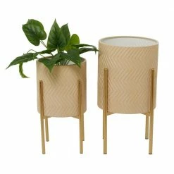 Litton Lane CosmoLiving by Cosmopolitan 23 in. H x 12 in. Beige Metal Bohemian Planter ( Set of 2)