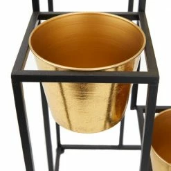 Litton Lane CosmoLiving by Cosmopolitan 30 in. x 13 in. Black Metal Glam Planter -Litton Lane Sales Store black litton lane plant pots 040324 1f 1000