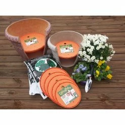 Bloem Ups-A-Daisy Round 16 in. Plastic Planter Lift Insert -Litton Lane Sales Store bloem plant liners t6326 31 1000