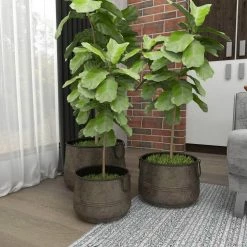 Litton Lane 16 in. x 11 in. Round Indoor Outdoor Distressed Bucket Style Brass Metal Planter with Side Ring Handles (Set of 3) 17 Litton Lane 16 in. x 11 in. Round Indoor Outdoor Distressed Bucket Style Brass Metal Planter with Side Ring Handles (Set of 3) -Litton Lane Sales Store brass litton lane plant pots 69183 c3 1000