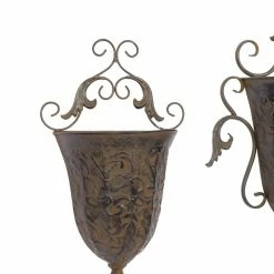Litton Lane 22 in. x 16 in. Brown Metal Traditional Planter (Set of 2) 18 Litton Lane 22 in. x 16 in. Brown Metal Traditional Planter (Set of 2) -Litton Lane Sales Store brown litton lane plant pots 69133 44 1000