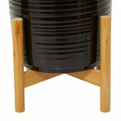 Litton Lane 13 in., 11 in., 10 in. Black Stoneware Contemporary Planter (Set of 3) -Litton Lane Sales Store glossy black litton lane plant pots 040492 4f 1000