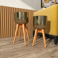 Litton Lane 24 in. x 13 in. Gold Metal Modern Planter (Set of 2) 19 Litton Lane 24 in. x 13 in. Gold Metal Modern Planter (Set of 2) -Litton Lane Sales Store gold litton lane plant pots 37886 1f 1000