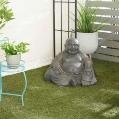Litton Lane 18 in. Black Magnesium Oxide Traditional Buddha Garden Sculpture -Litton Lane Sales Store litton lane garden statues 040765 31 1000