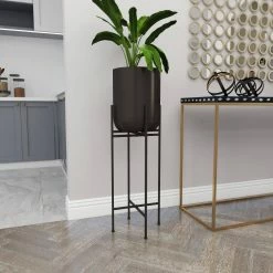 Litton Lane 36 in. H x 12 in. W Black Metal Modern Planter 17 Litton Lane 36 in. H x 12 in. W Black Metal Modern Planter -Litton Lane Sales Store matte black litton lane plant pots 74805 1f 1000