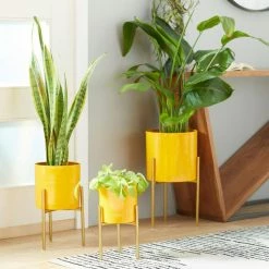 Litton Lane 18 in. x 10 in. Yellow Metal Contemporary Planter (Set of 3) -Litton Lane Sales Store yellow litton lane plant pots 51978 d4 1000